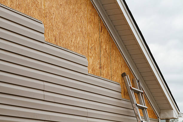 Professional Storm Damage Siding Repair technician working in Fort Lee, VA